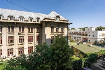 Фото номера Двухместный номер с 2 отдельными кроватями - Подходит для гостей с ограниченными физическими возможностями Отель Hotel Parliament г. Бухарест 7