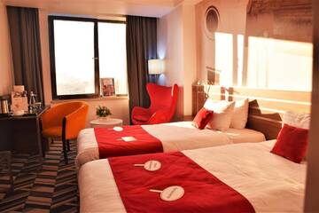 Фото номера Улучшенный двухместный номер с 2 отдельными кроватями Отель Mercure Bucharest Unirii г. Бухарест 2