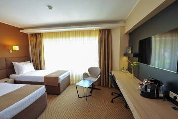 Фото номера Стандартный двухместный номер с 2 отдельными кроватями Отель Crystal Palace Hotel г. Бухарест 5