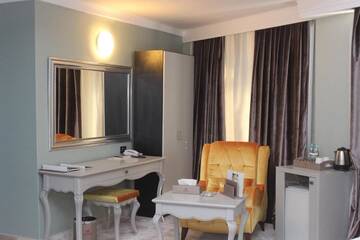 Фото номера Улучшенный двухместный номер с 1 кроватью Отель Phoenicia Grand Hotel г. Бухарест 11