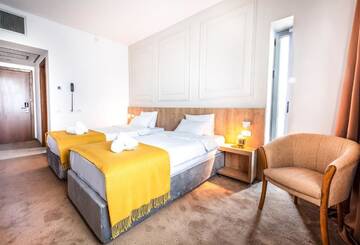 Фото номера Двухместный номер с 2 отдельными кроватями Отель Best Western Stil Hotel г. Бухарест 9