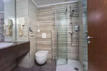 Фото номера Двухместный номер с 2 отдельными кроватями Отель Best Western Stil Hotel г. Бухарест 11