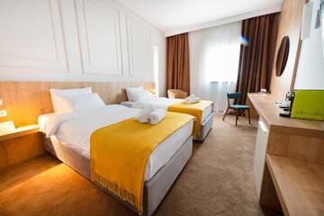 Фото номера Двухместный номер с 2 отдельными кроватями Отель Best Western Stil Hotel г. Бухарест 3