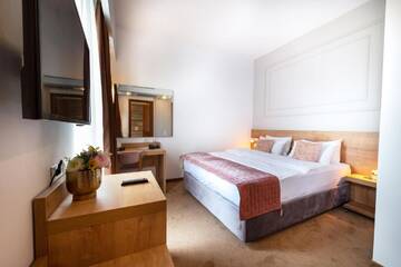 Фото номера Номер с кроватью размера «queen-size» Отель Best Western Stil Hotel г. Бухарест 5