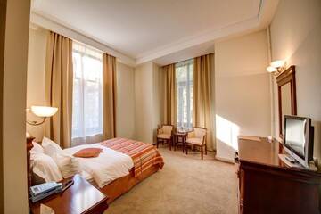 Фото номера Стандартный двухместный номер с 1 кроватью Отель Atrium Hotel Ateneu City Center г. Бухарест 9