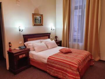 Фото номера Стандартный двухместный номер с 1 кроватью Отель Atrium Hotel Ateneu City Center г. Бухарест 12