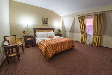 Фото номера Двухместный номер Делюкс с 1 кроватью Отель Atrium Hotel Ateneu City Center г. Бухарест 4