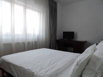 Фото номера Апартаменты с 2 спальнями и балконом (4 взрослых) Отель Monte Carlo Palace Suites г. Бухарест 6