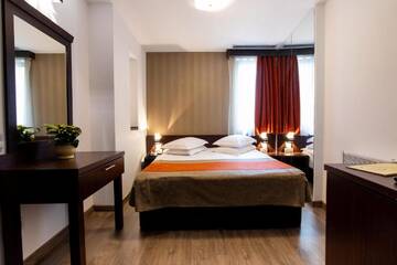 Фото номера Двухместный номер эконом-класса с 1 кроватью Отель Hotel Duke Armeneasca - Ex Tempo г. Бухарест 6