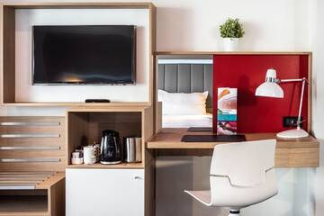 Фото номера Стандартный номер Апарт-отели Park Inn by Radisson Bucharest Hotel &amp; Residence г. Бухарест 10