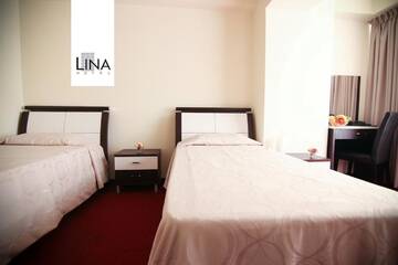 Фото номера Двухместный номер «Комфорт» с 2 отдельными кроватями Отель Lina Hotel г. Бухарест 7