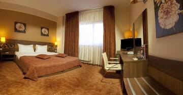 Фото номера Стандартный двухместный номер с 2 отдельными кроватями Отель RIN Central Hotel г. Бухарест 7