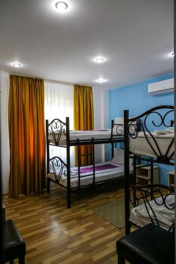 Фото номера Четырехместный номер Гостевой дом City Comfort Villa г. Бухарест 2