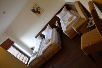 Фото номера Трехместный номер Отель Phoenicia Comfort Hotel г. Бухарест 6