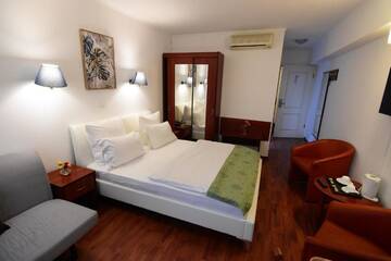 Фото номера Стандартный двухместный номер с 1 кроватью Отель Atrium Hotel Bucharest City Center г. Бухарест 15