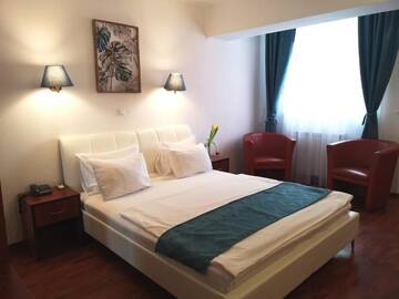 Фото номера Стандартный двухместный номер с 1 кроватью Отель Atrium Hotel Bucharest City Center г. Бухарест 25