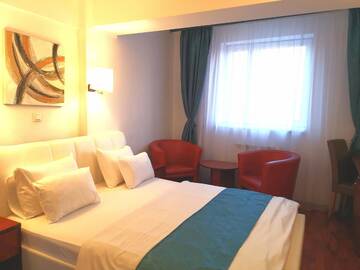 Фото номера Стандартный двухместный номер с 1 кроватью Отель Atrium Hotel Bucharest City Center г. Бухарест 9
