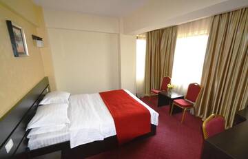 Фото номера Двухместный номер бизнес-класса с 1 кроватью Отель Hotel Ancor г. Бухарест 8