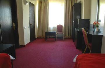 Фото номера Двухместный номер бизнес-класса с 2 отдельными кроватями Отель Hotel Ancor г. Бухарест 4
