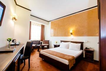 Фото номера Стандартный двухместный номер с 1 кроватью Отель International Bucharest City Centre Hotel г. Бухарест 7