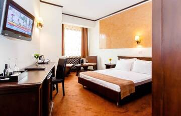 Фото номера Стандартный двухместный номер с 1 кроватью Отель International Bucharest City Centre Hotel г. Бухарест 10