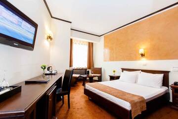 Фото номера Стандартный двухместный номер с 1 кроватью Отель International Bucharest City Centre Hotel г. Бухарест 11