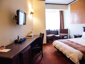Фото номера Стандартный двухместный номер с 1 кроватью Отель International Bucharest City Centre Hotel г. Бухарест 5