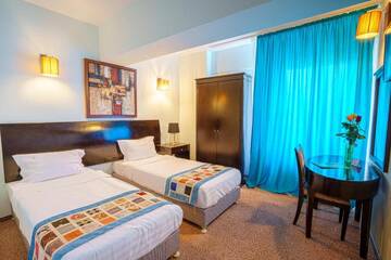 Фото номера Стандартный двухместный номер с 2 отдельными кроватями Отель Avis Hotel By WS Hotel Group г. Бухарест 6