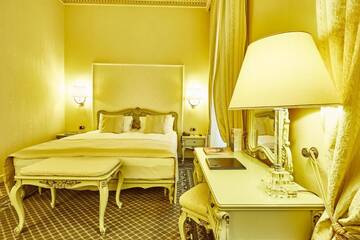 Фото номера Улучшенный двухместный номер с 1 кроватью Отель Grand Hotel Continental г. Бухарест 4