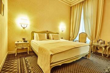 Фото номера Улучшенный двухместный номер с 1 кроватью Отель Grand Hotel Continental г. Бухарест 6