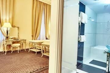 Фото номера Улучшенный двухместный номер с 2 отдельными кроватями Отель Grand Hotel Continental г. Бухарест 6