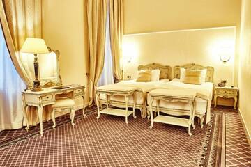 Фото номера Улучшенный двухместный номер с 2 отдельными кроватями Отель Grand Hotel Continental г. Бухарест 3