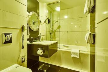 Фото номера Улучшенный двухместный номер с 1 кроватью Отель Grand Hotel Continental г. Бухарест 8