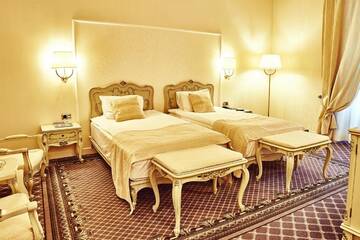 Фото номера Улучшенный двухместный номер с 2 отдельными кроватями Отель Grand Hotel Continental г. Бухарест 2