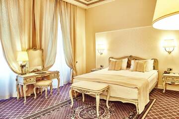 Фото номера Двухместный номер Делюкс с 1 кроватью Отель Grand Hotel Continental г. Бухарест 4