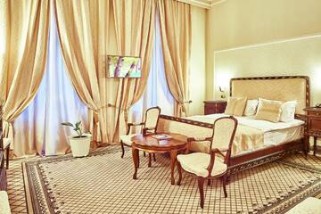 Фото номера Двухместный номер Делюкс с 1 кроватью Отель Grand Hotel Continental г. Бухарест 6