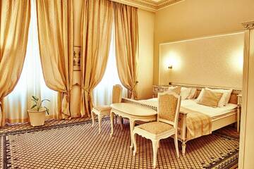 Фото номера Двухместный номер Делюкс с 1 кроватью Отель Grand Hotel Continental г. Бухарест 11