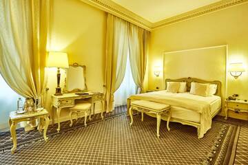 Фото номера Двухместный номер Делюкс с 1 кроватью Отель Grand Hotel Continental г. Бухарест 15