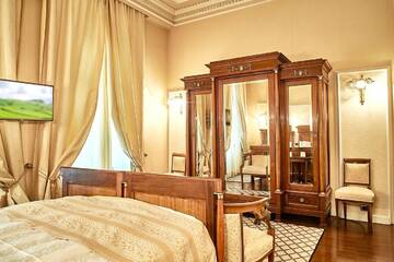 Фото номера Улучшенный двухместный люкс с 1 кроватью Отель Grand Hotel Continental г. Бухарест 5