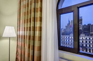 Фото номера Стандартный двухместный номер с 1 кроватью Отель Capitol Hotel г. Бухарест 7