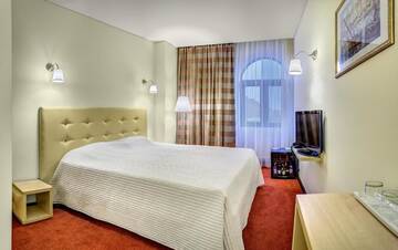 Фото номера Стандартный двухместный номер с 1 кроватью Отель Capitol Hotel г. Бухарест 15