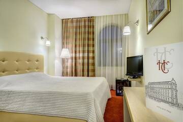 Фото номера Стандартный двухместный номер с 1 кроватью Отель Capitol Hotel г. Бухарест 10