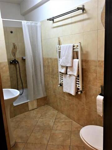 Фото номера Стандартный трехместный номер Отель Hotel Taco г. Бухарест 4