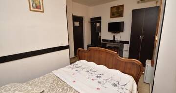 Фото номера Одноместный номер с ванной комнатой Отель Hotel Taco г. Бухарест 2