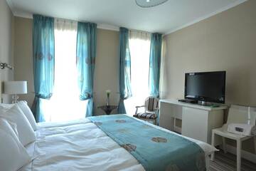 Фото номера Стандартный двухместный номер с 1 кроватью Отель Hotel Boutique Vila Arte г. Бухарест 2