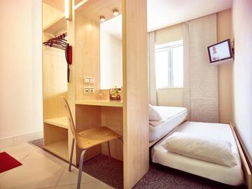 Фото номера Семейный номер (для 2 взрослых и 1 ребенка) Отель Hello Hotels Gara de Nord г. Бухарест 4