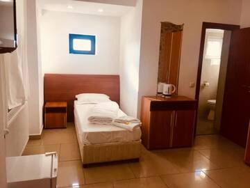 Фото номера Двухместный номер с 2 отдельными кроватями Отель Liad Hotel г. Бухарест 5